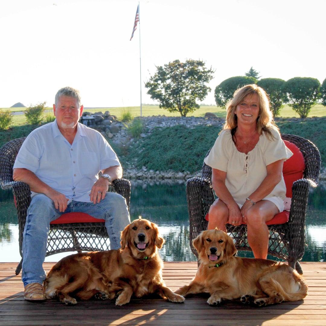 David and Judy on the deck overlooking the pond